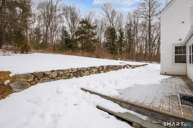 a view of a snow on the road