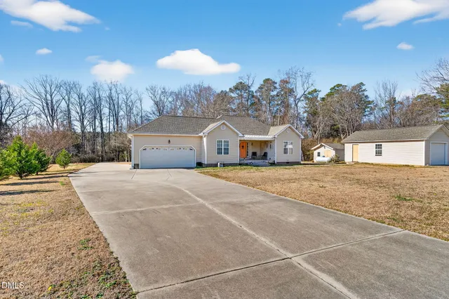 a house view with a outdoor space