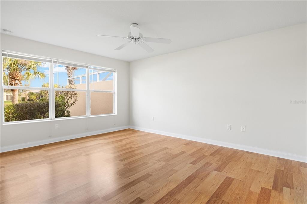 13222 Huerta Street Venice, FL 34293 - Photo 28 of 85 a view of an empty room with a window