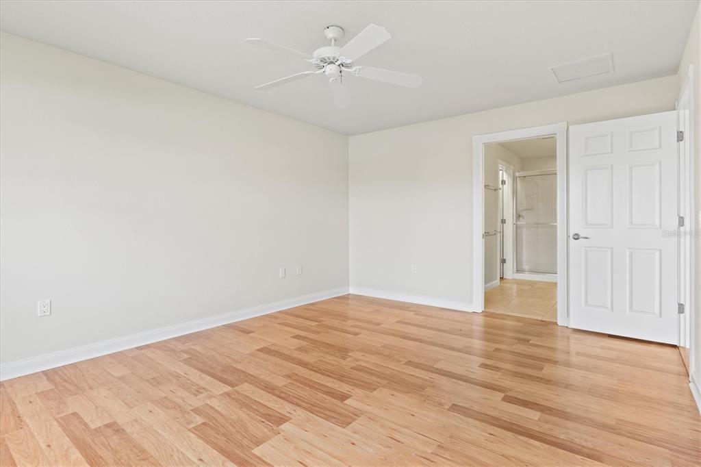 13222 Huerta Street Venice, FL 34293 - Photo 30 of 85 wooden floor in an empty room