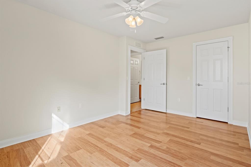 13222 Huerta Street Venice, FL 34293 - Photo 37 of 85 a view of empty room with wooden floor