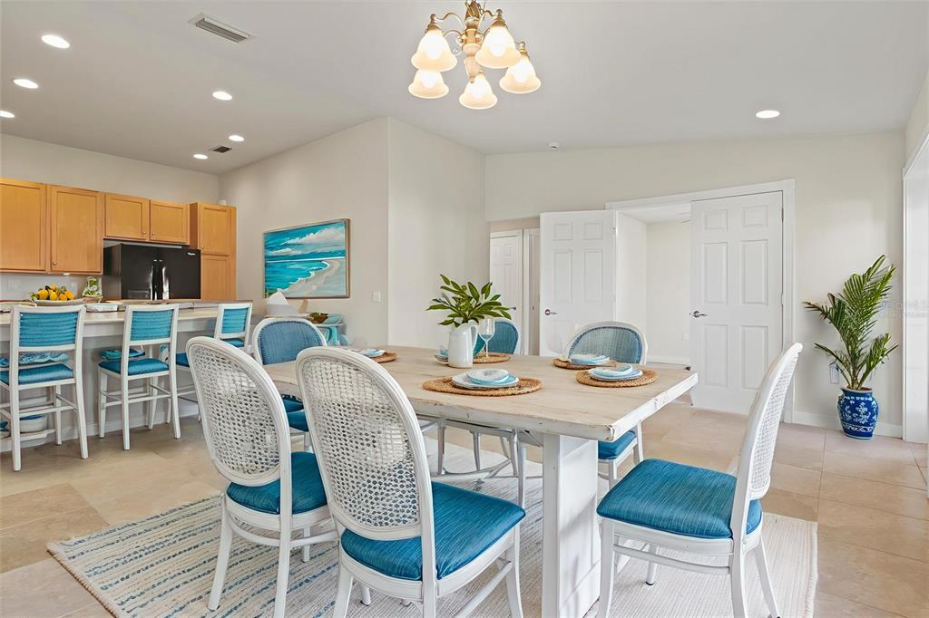 13222 Huerta Street Venice, FL 34293 - Photo 10 of 85 a view of a dining room with furniture
