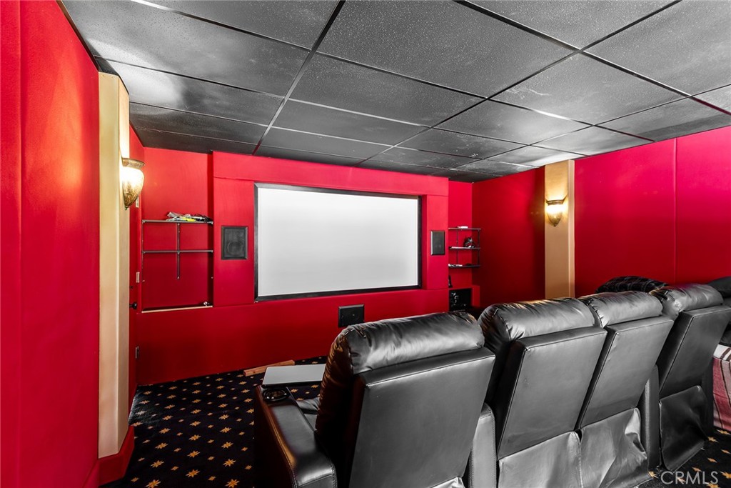 24308 Bridle Trail Road Hidden Hills, CA 91302 - Photo 13 of 29 a room with furniture and screen