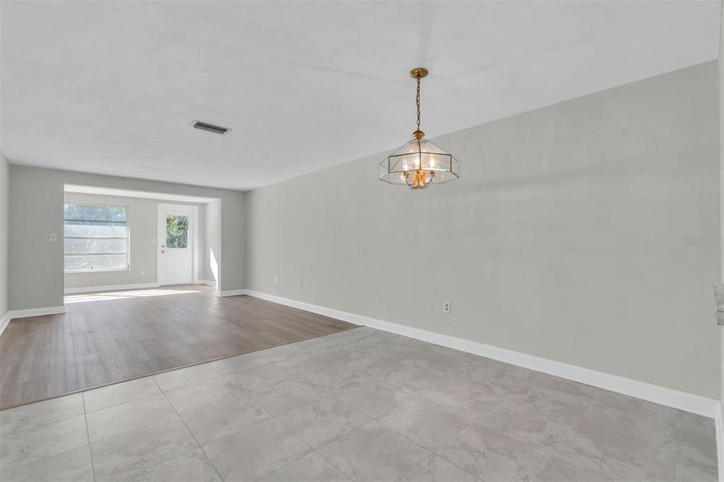 4343 Summersun Drive, Unit 4343 New Port Richey, FL 34652 - Photo 11 of 50 a view of an empty room with a window