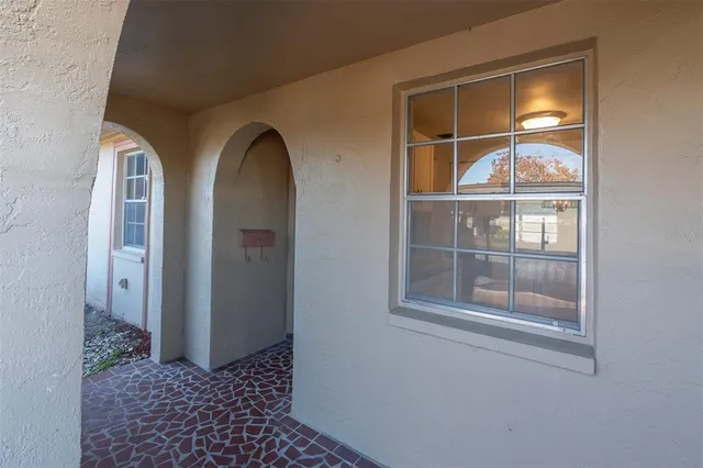 a view of a livingroom with a and window