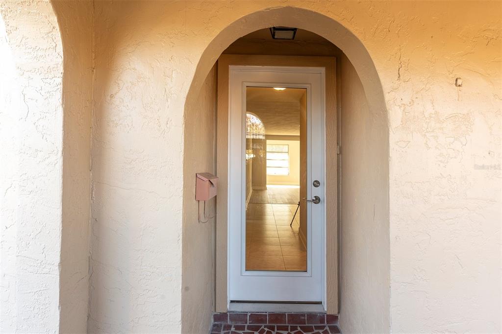 4343 Summersun Drive, Unit 4343 New Port Richey, FL 34652 - Photo 3 of 50 a view of a livingroom with a and window