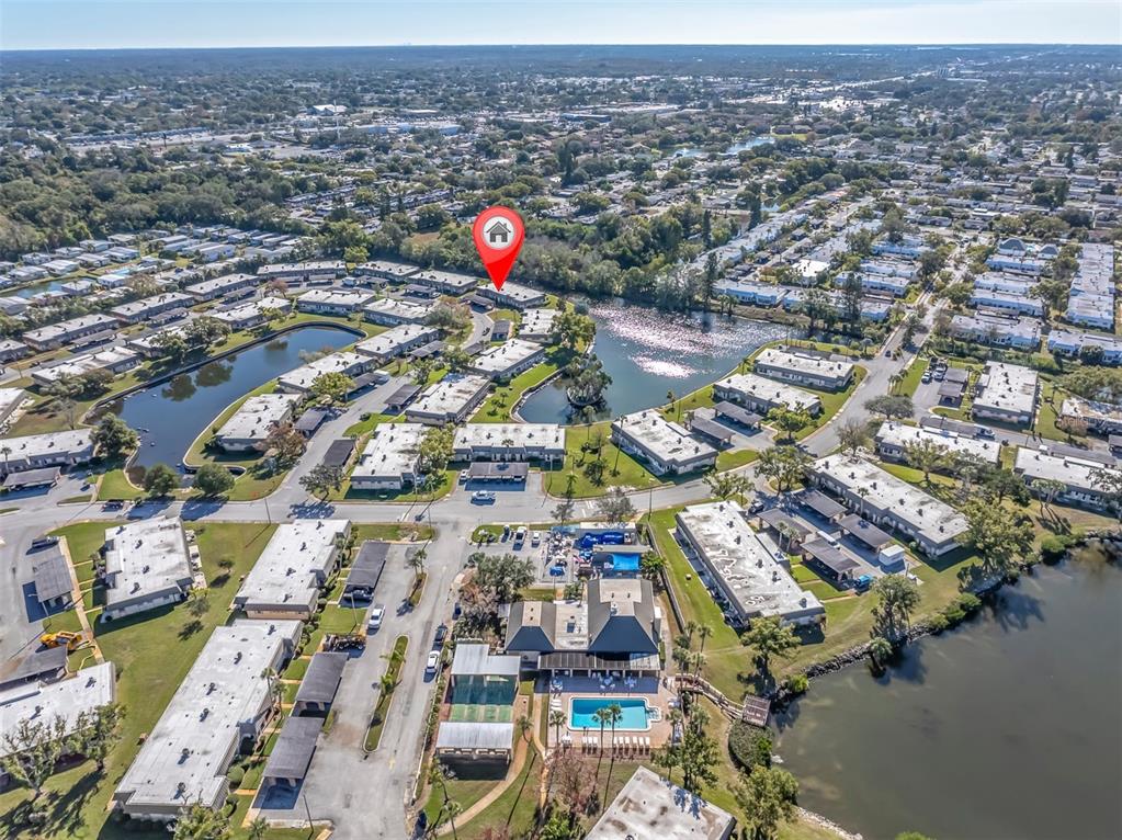 4343 Summersun Drive, Unit 4343 New Port Richey, FL 34652 - Photo 31 of 50 an aerial view of a city