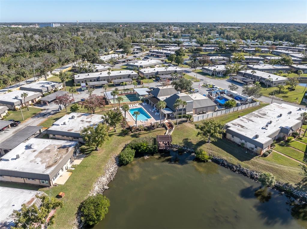 4343 Summersun Drive, Unit 4343 New Port Richey, FL 34652 - Photo 36 of 50 an aerial view of residential houses with outdoor space