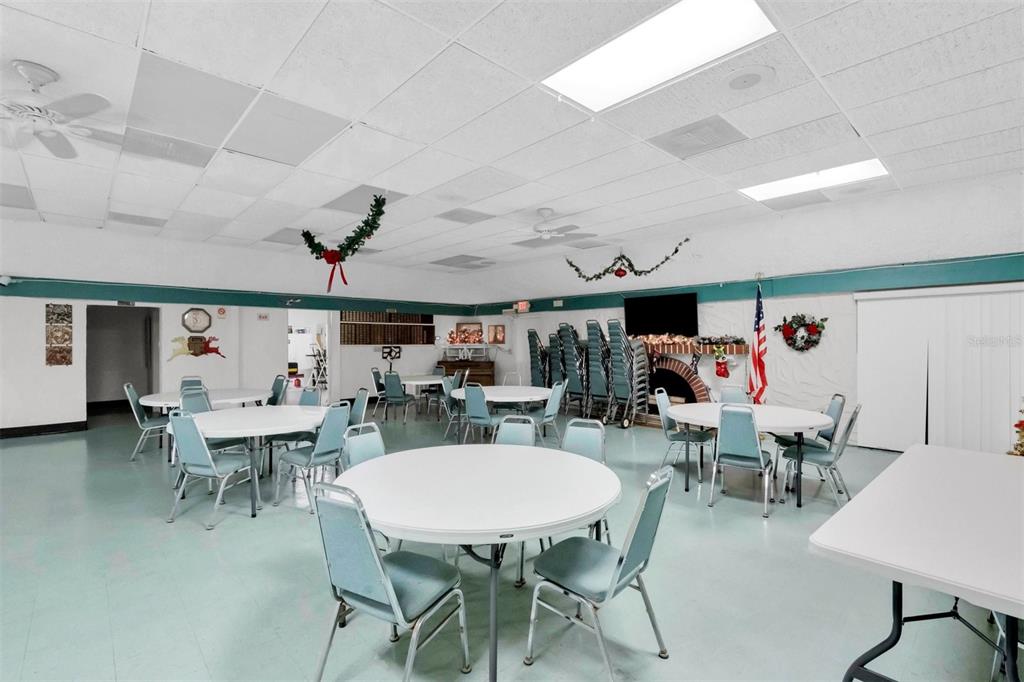 4343 Summersun Drive, Unit 4343 New Port Richey, FL 34652 - Photo 43 of 50 a view of a dining room with furniture