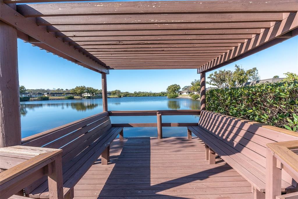 4343 Summersun Drive, Unit 4343 New Port Richey, FL 34652 - Photo 50 of 50 a view of sitting area with furniture and lake view