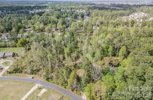 a view of a yard with an outdoor space
