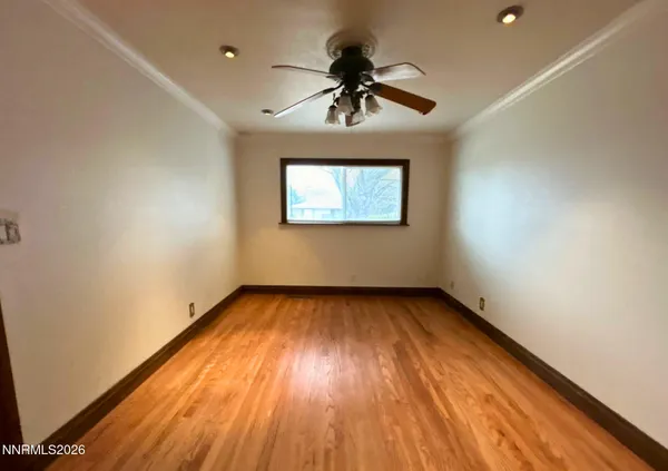 a view of an empty room and window