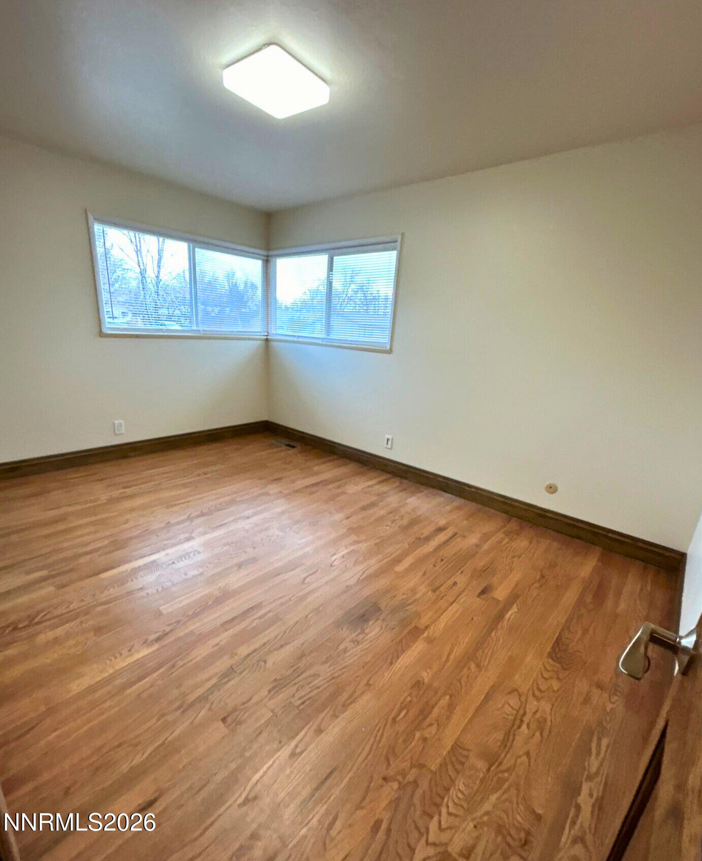 1010 Tyler Way Sparks, NV 89431 - Photo 10 of 11 an empty room with windows