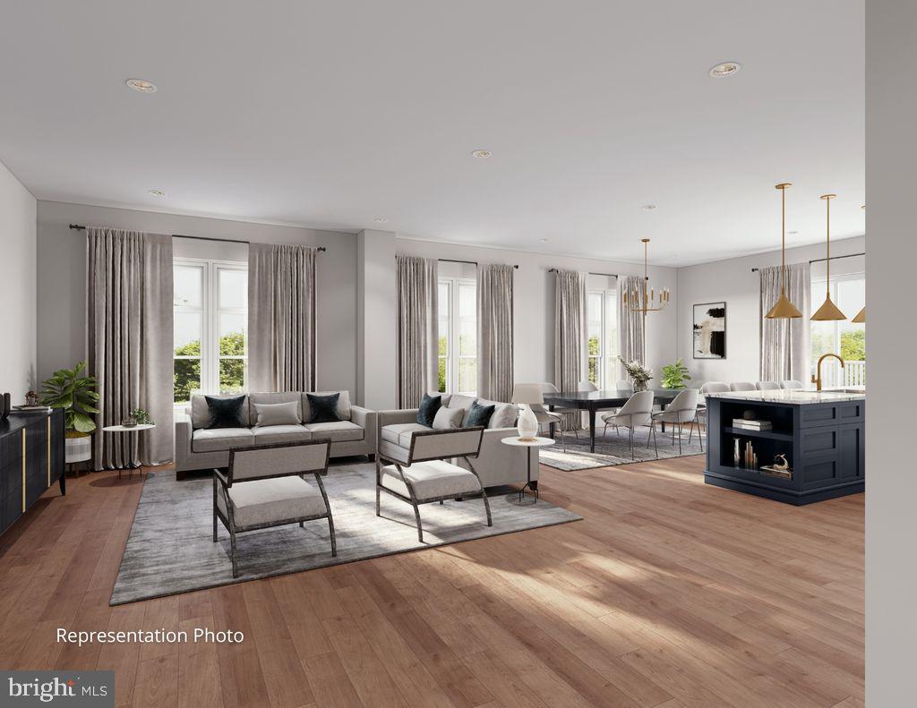 117 Blackford Boulevard, Unit 203 Lebanon, PA 17042 - Photo 3 of 6 a living room with furniture a fireplace a lamp and a window