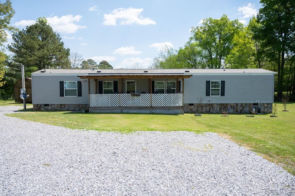 4526 Mt Pleasant Road Cohutta, GA 30710 - Photo 3 of 24 a front view of house with yard and outdoor seating