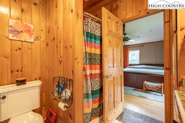 a bathroom with a bathtub and shower