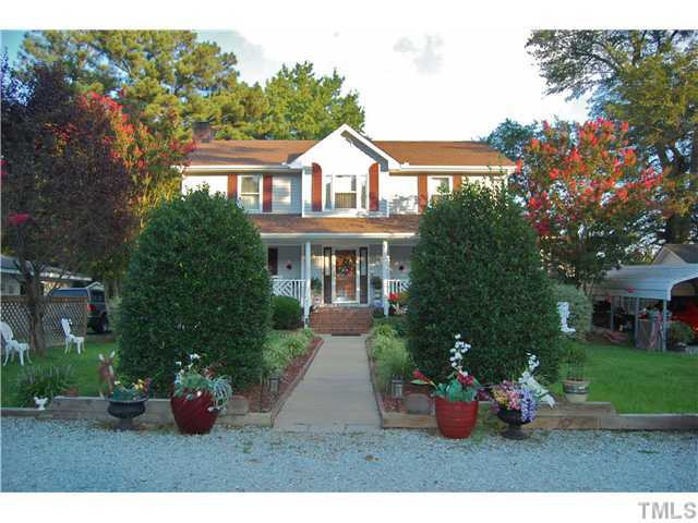 628 Junction Road Durham, NC 27703 - Photo 2 of 3 a front view of house with yard