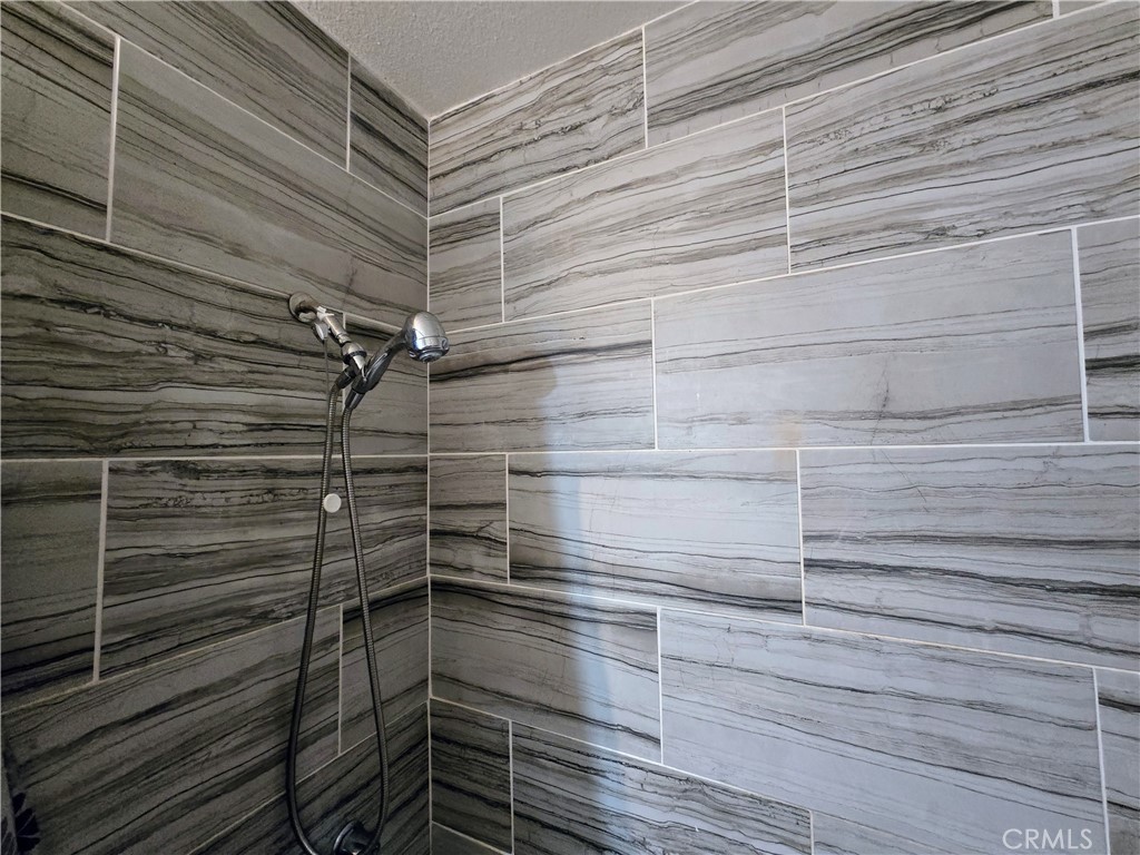 40525 166th Street East Lancaster, CA 93535 - Photo 12 of 30 a bathroom with a shower