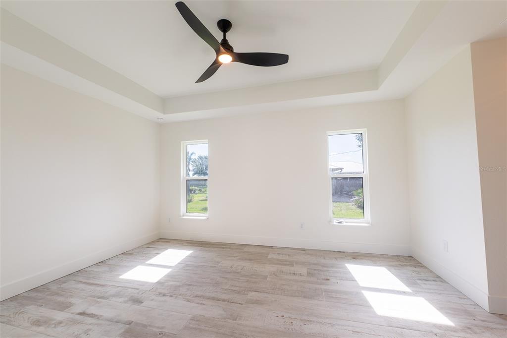 8846 Southwest Liverpool Road Arcadia, FL 34269 - Photo 22 of 29 an empty room with windows and closet