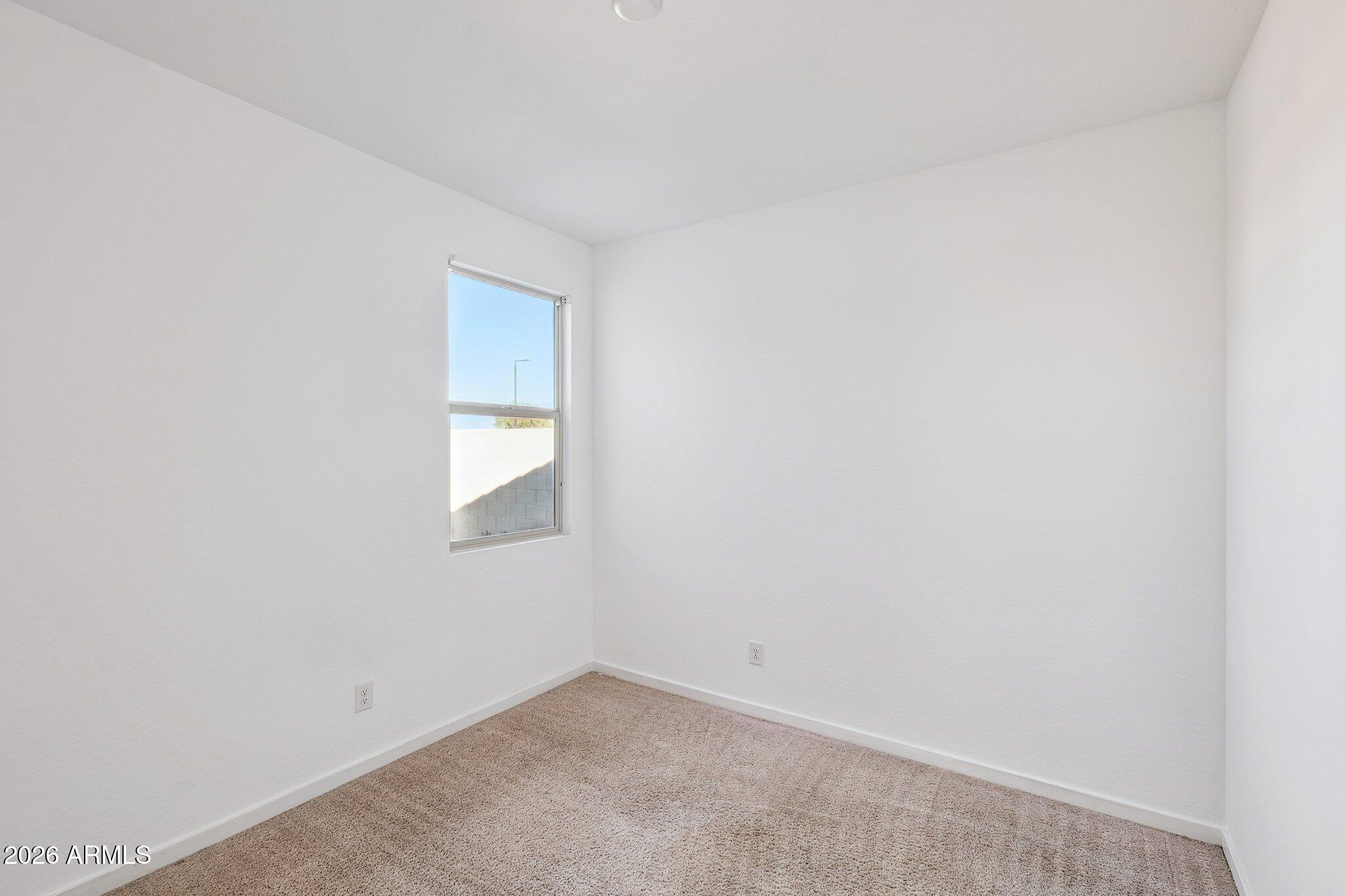 4313 West Allen Street Laveen, AZ 85339 - Photo 13 of 22 a view of an empty room