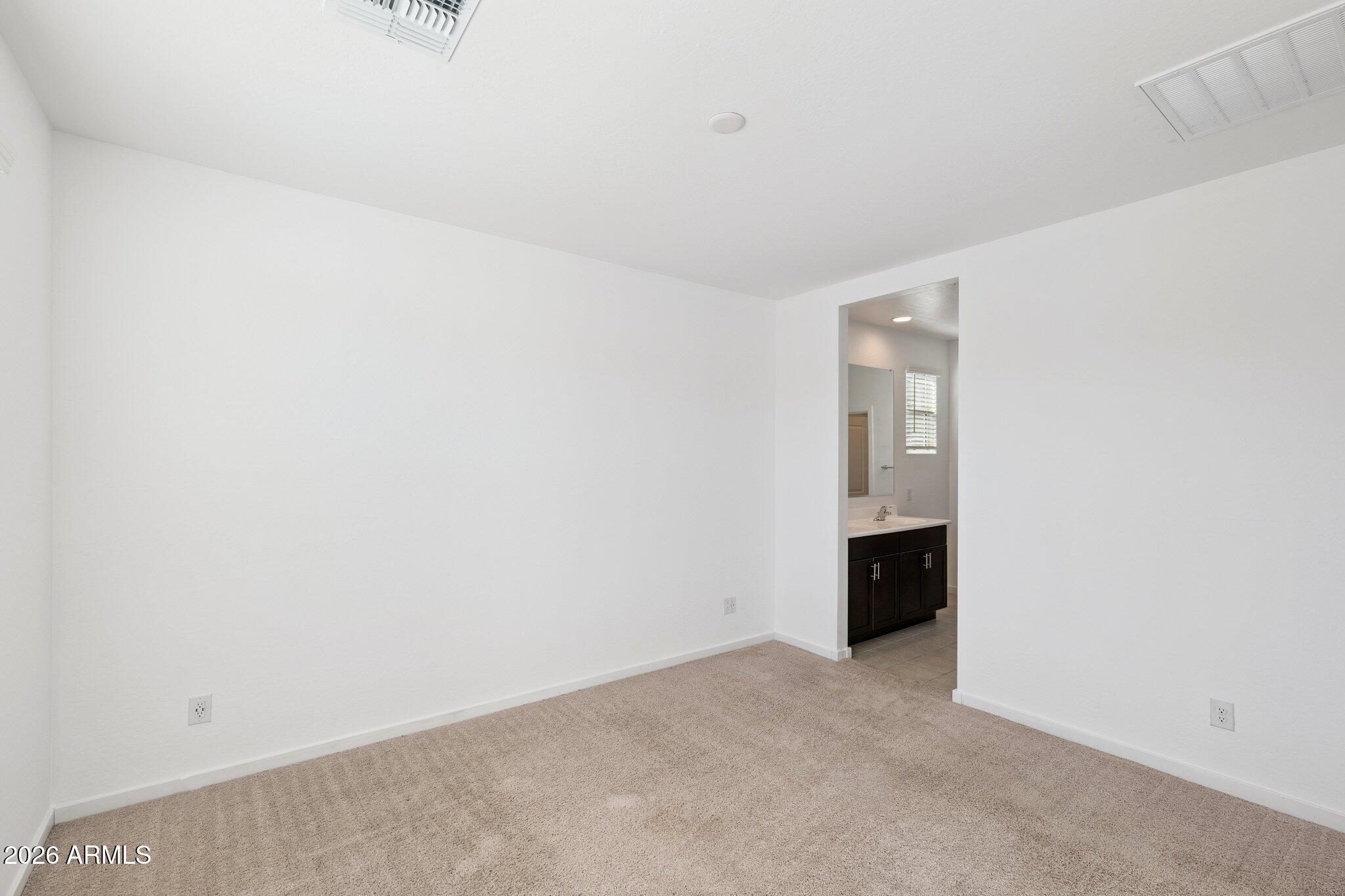 4313 West Allen Street Laveen, AZ 85339 - Photo 7 of 22 a view of an empty room