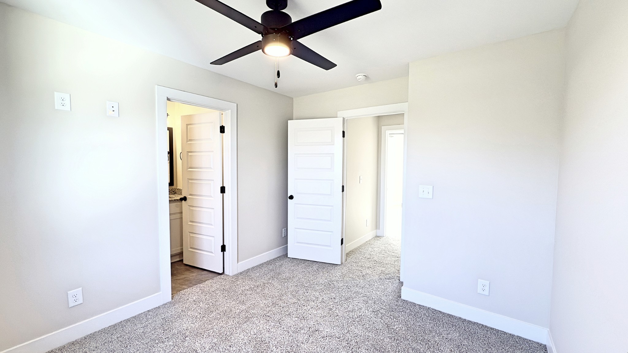 305 Pollard Road Clarksville, TN 37042 - Photo 12 of 14 an empty room with closet and a ceiling fan