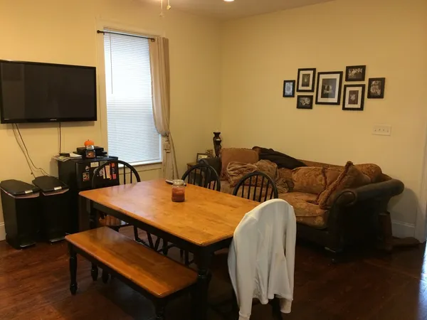a view of a dining room with furniture