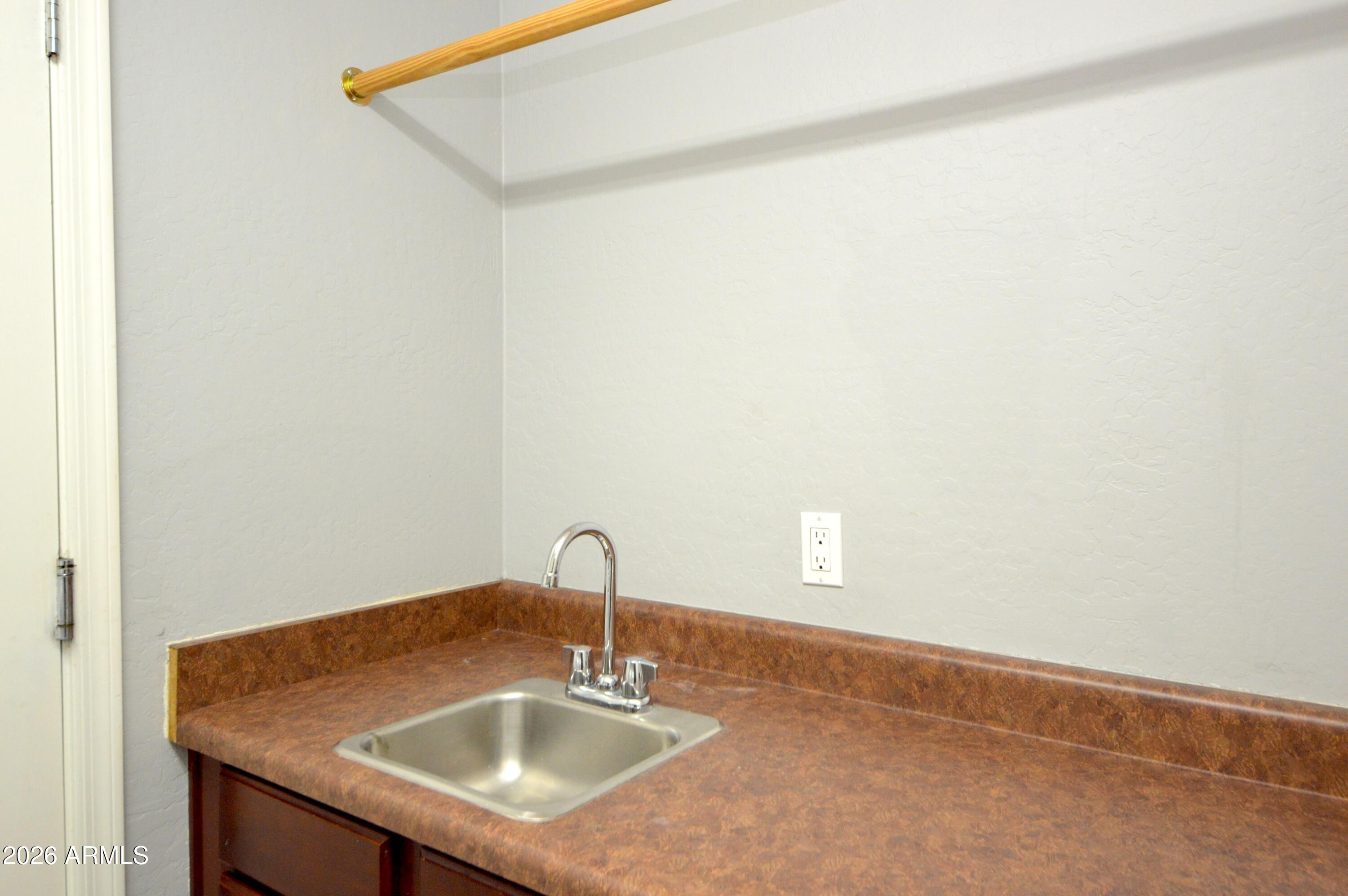 5115 West Novak Way Laveen, AZ 85339 - Photo 49 of 52 Laundry Room Sink & Cabinet