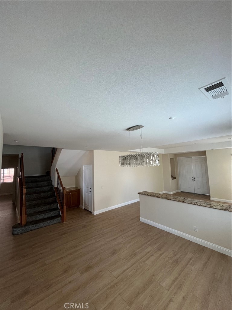 18388 Hidden Ranch Road Riverside, CA 92508 - Photo 46 of 46 a view of a livingroom with wooden floor
