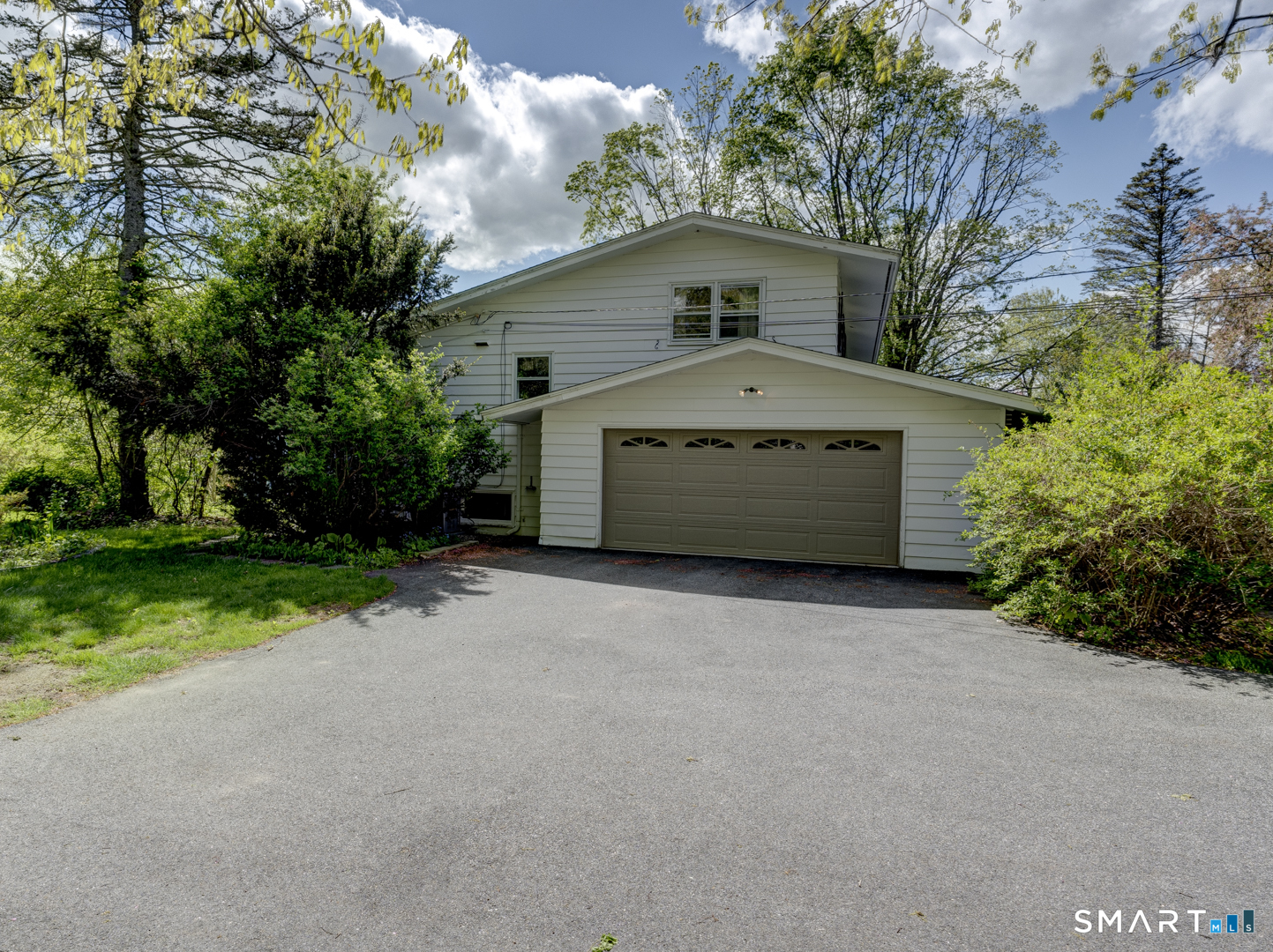 284 Chestnut Hill Road Torrington, CT 06790 - Photo 30 of 37 Side entry to garage, plenty of parking space