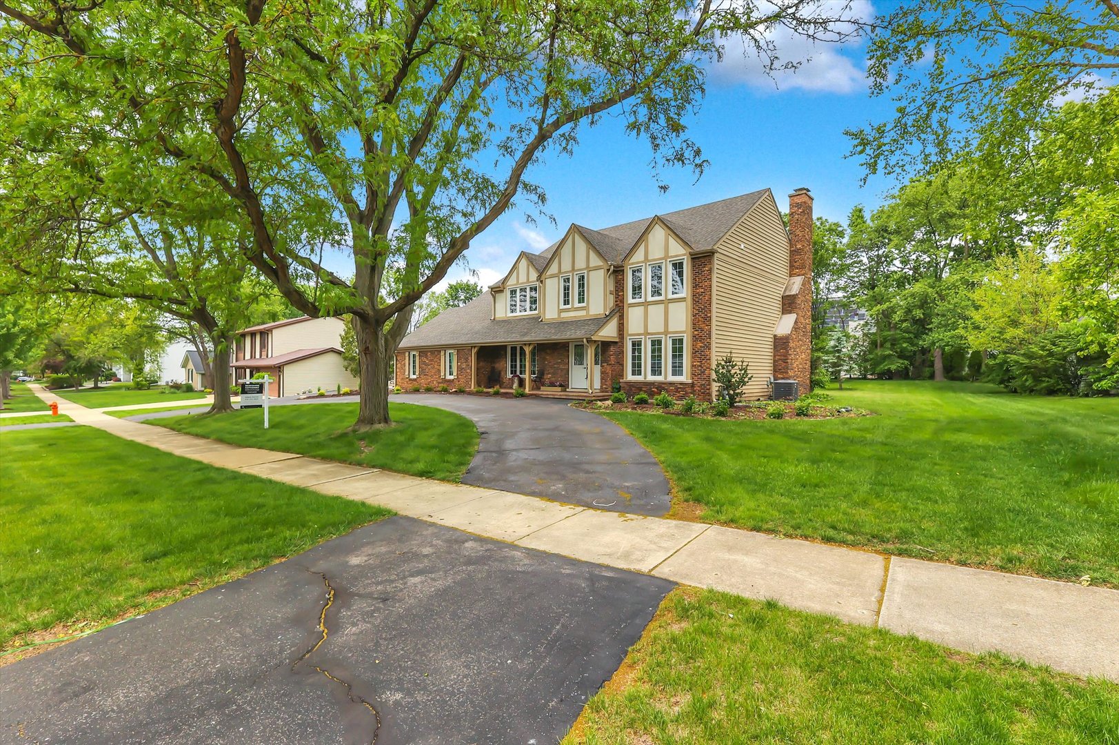 967 West Bauer Road Naperville, IL 60563 - Photo 1 of 37 a front view of a house with a yard