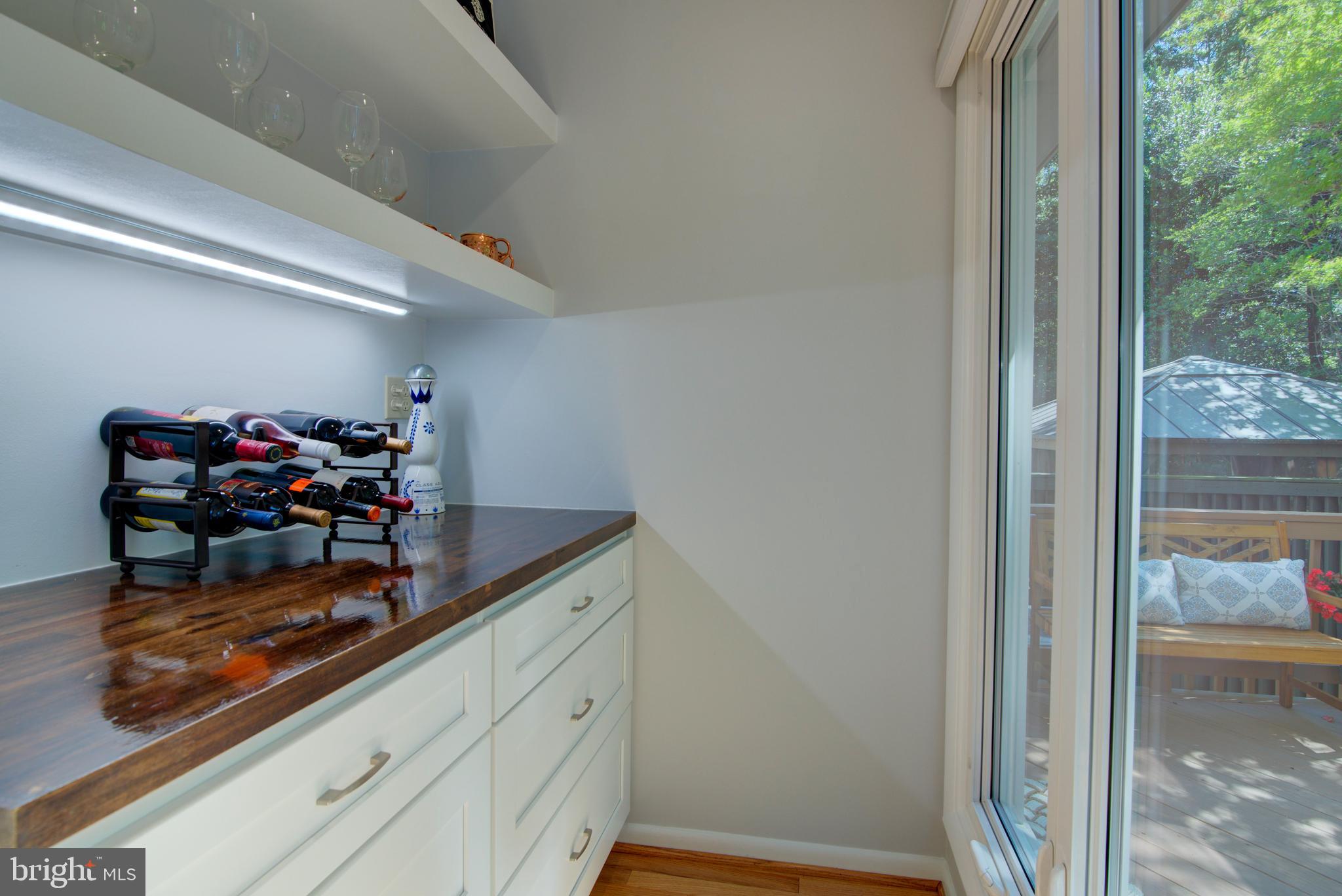 11619 Chapel Cross Way Reston, VA 20194 - Photo 6 of 33 Custom, Hip Bar with Shelving, Storage, Windows.