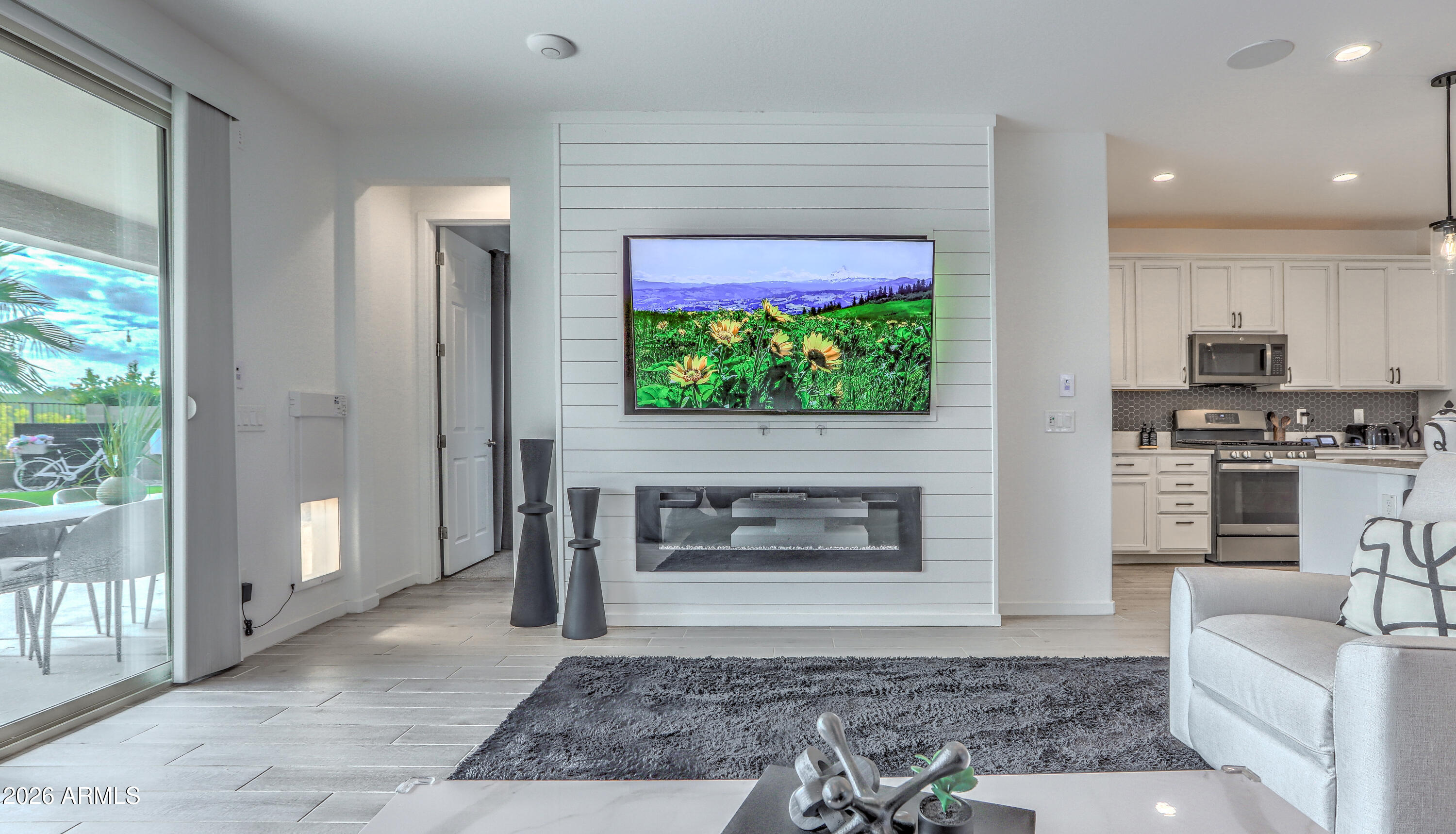 7727 West Agora Lane Phoenix, AZ 85043 - Photo 15 of 46 a living room with furniture and a fireplace