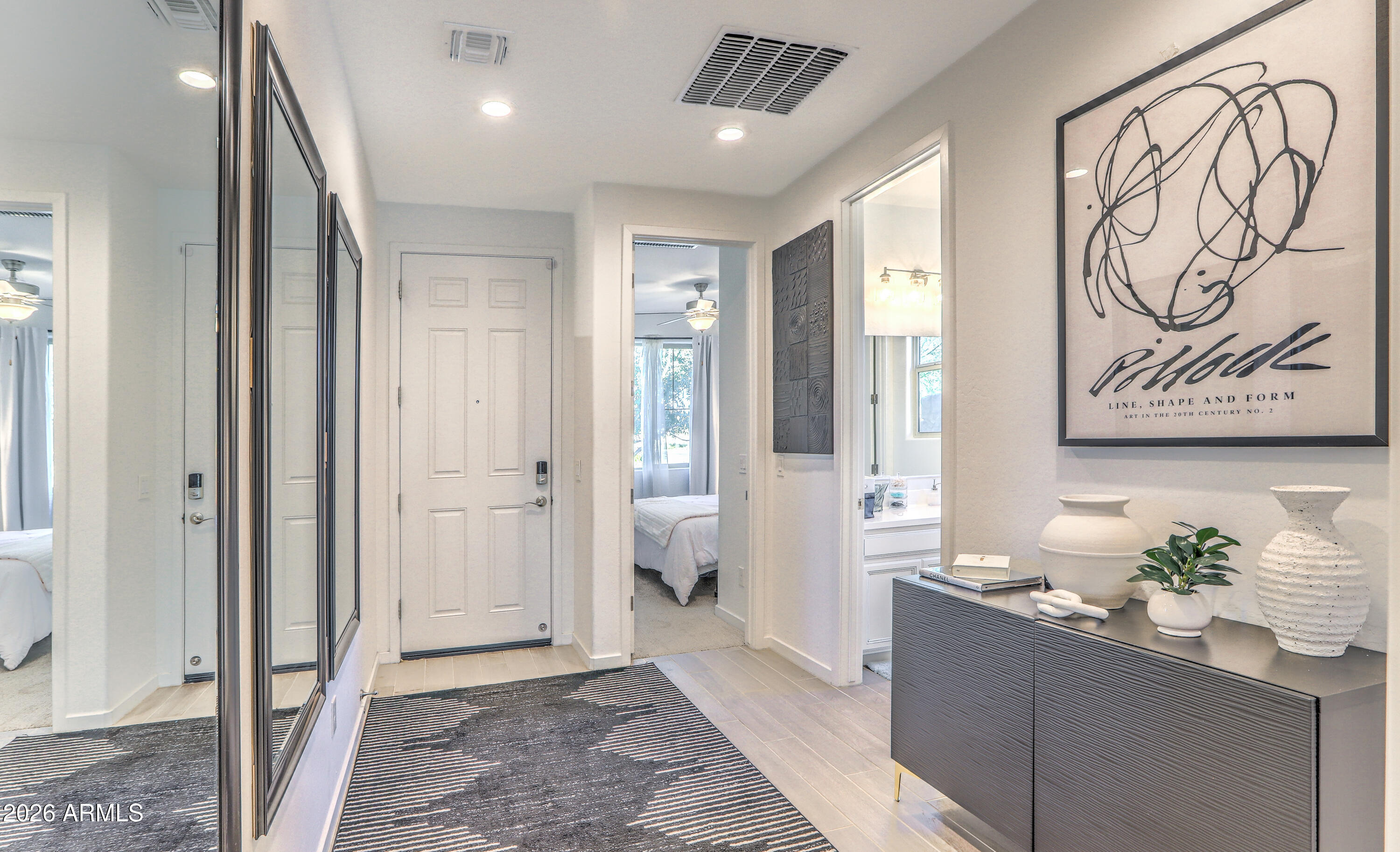 7727 West Agora Lane Phoenix, AZ 85043 - Photo 21 of 46 a bathroom with a sink and a mirror