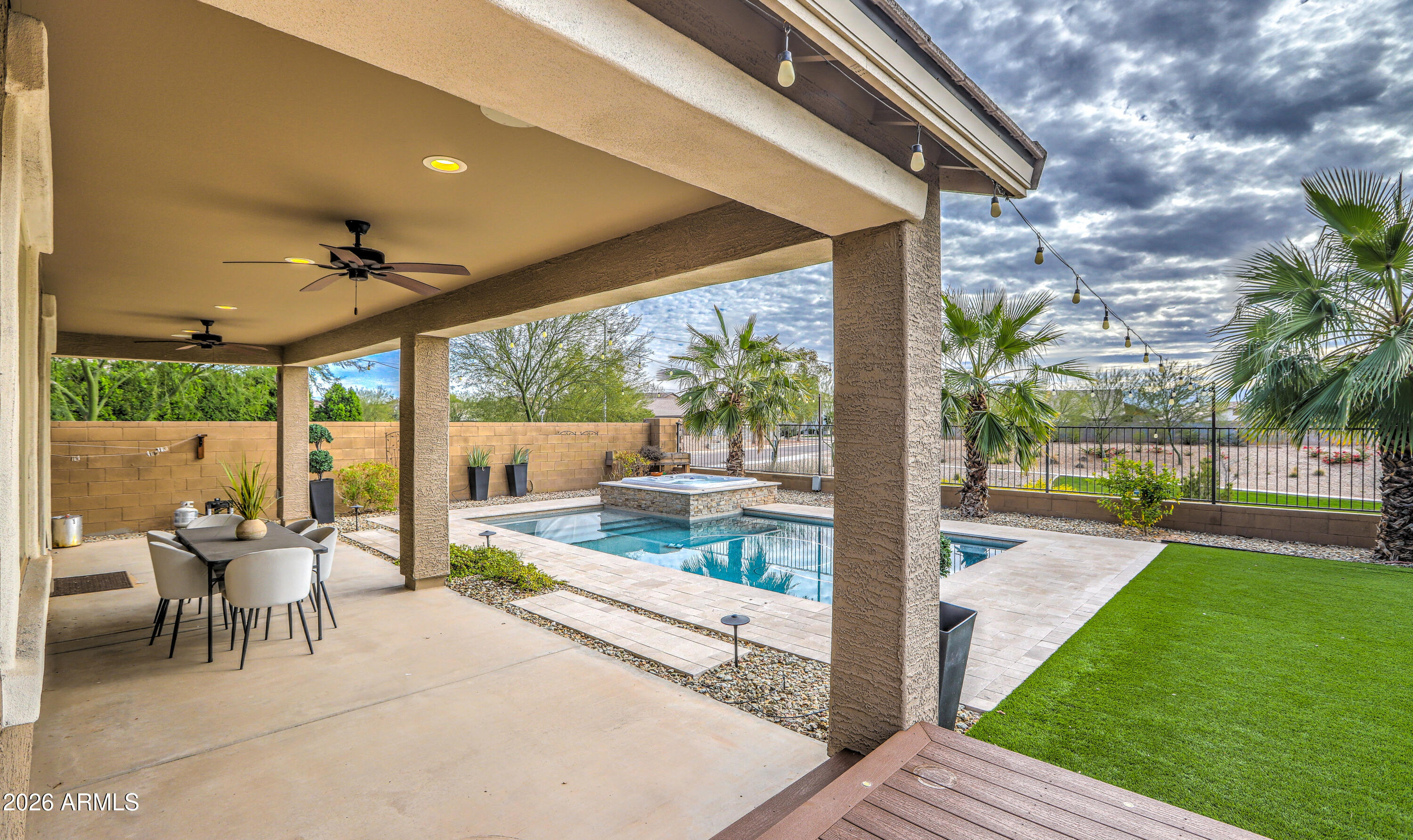 7727 West Agora Lane Phoenix, AZ 85043 - Photo 40 of 46 a view of a patio with a backyard