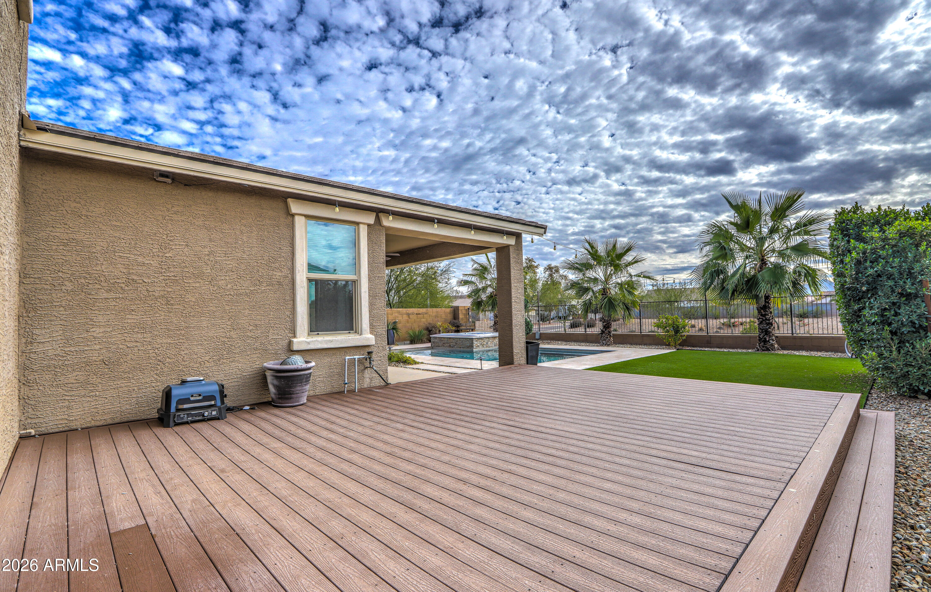 7727 West Agora Lane Phoenix, AZ 85043 - Photo 41 of 46 a view of a backyard with sitting area