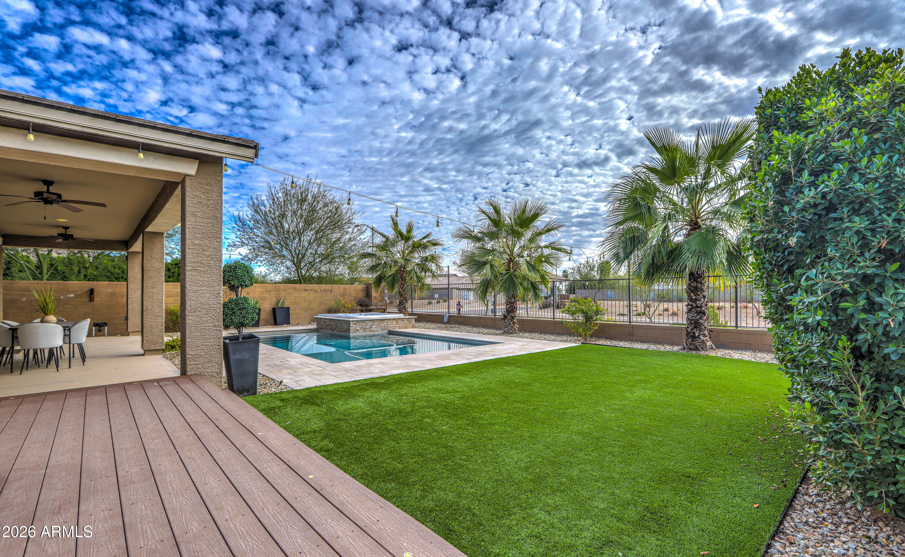 7727 West Agora Lane Phoenix, AZ 85043 - Photo 42 of 46 a view of a backyard with swimming pool