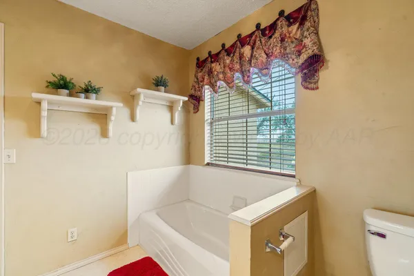 a bathroom with a sink and a bathtub