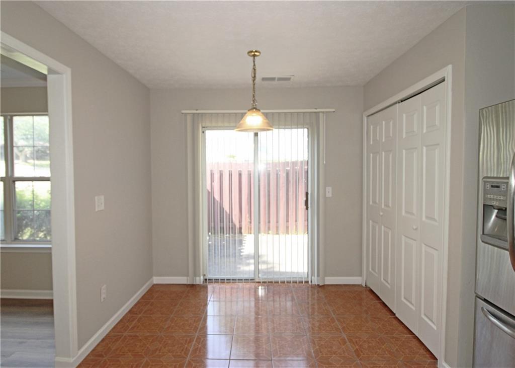 1334 Ambercrest Way Austell, GA 30168 - Photo 10 of 20 a view of an empty room with a window