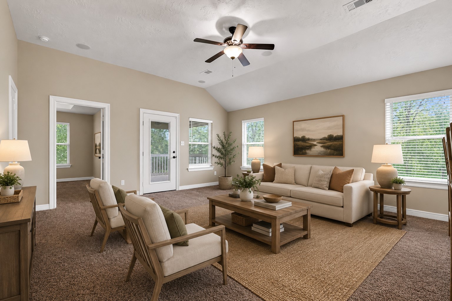 11930 Bastrop Beach Road Angleton, TX 77515 - Photo 12 of 29 Large windows frame peaceful views of the surrounding trees while the spacious family room offers vaulted ceilings, surround sound speakers, and direct access to the covered porch for effortless indoor-outdoor living. (Virtually Staged)