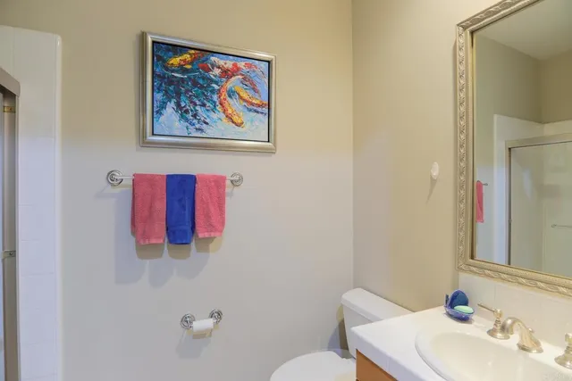 a bathroom with a toilet and a sink