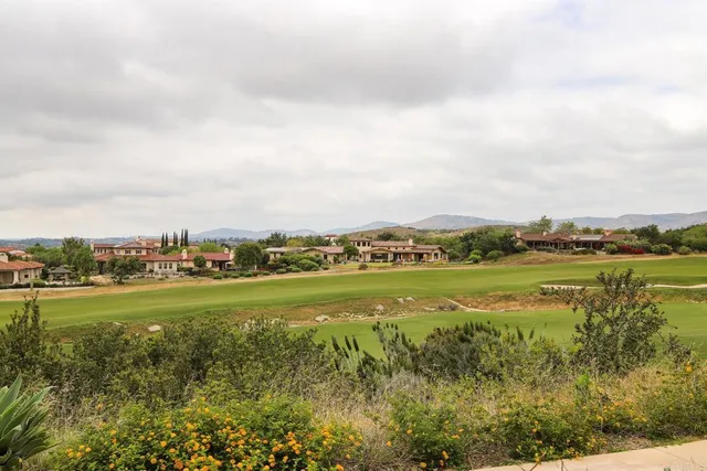 a view of an ocean and a mountain