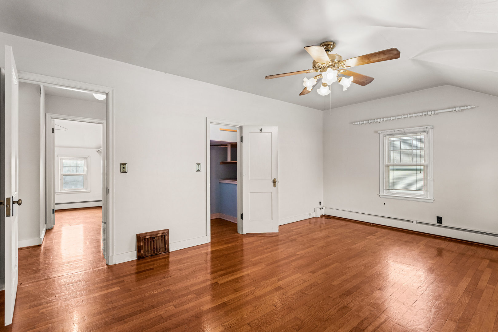400 East 3rd Street Brocton, IL 61917 - Photo 23 of 54 a view of an empty room with wooden floor and a window
