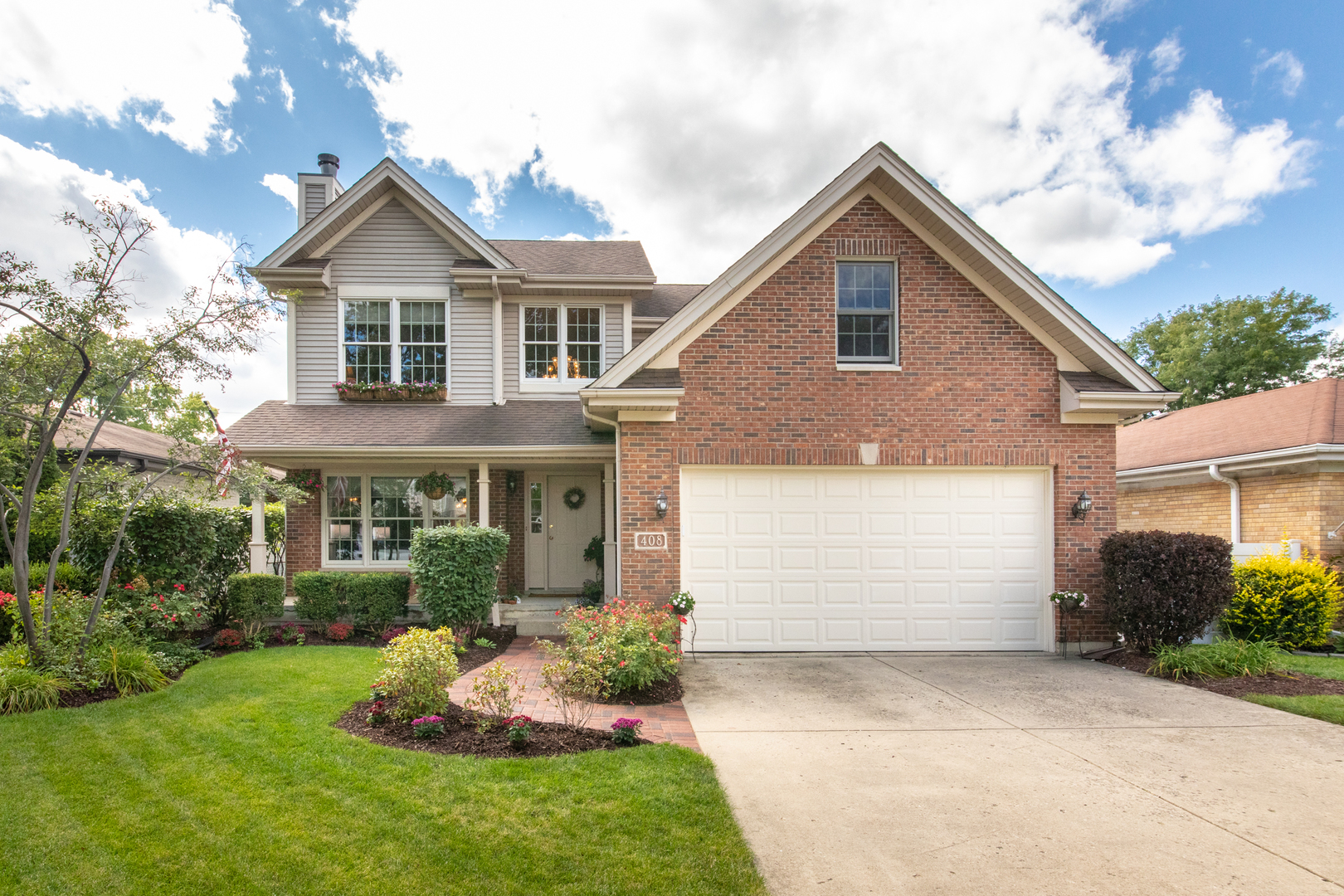 408 North Seminary Avenue Park Ridge, IL 60068 - Photo 1 of 26 a front view of a house with a yard and garage