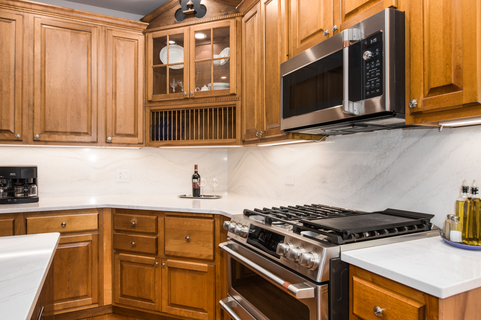 408 North Seminary Avenue Park Ridge, IL 60068 - Photo 11 of 26 a kitchen with wooden cabinets and a stove top oven