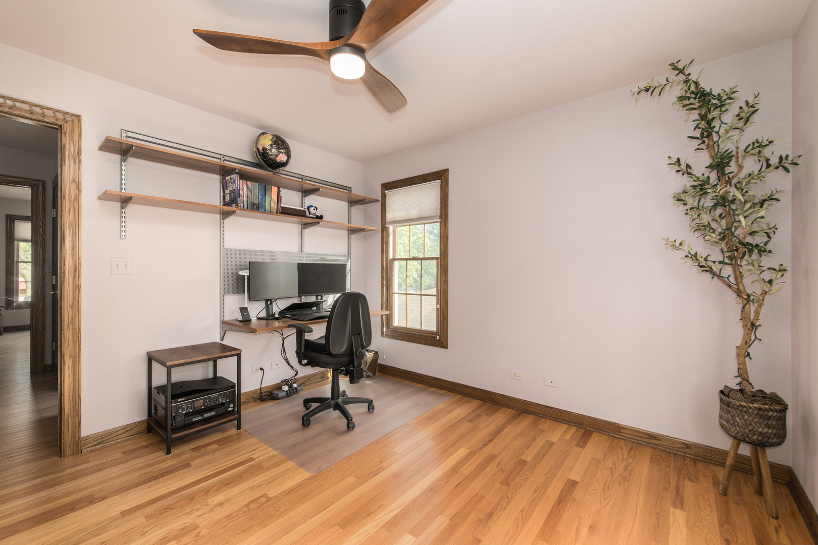 408 North Seminary Avenue Park Ridge, IL 60068 - Photo 19 of 26 a view of a workspace with furniture and a window