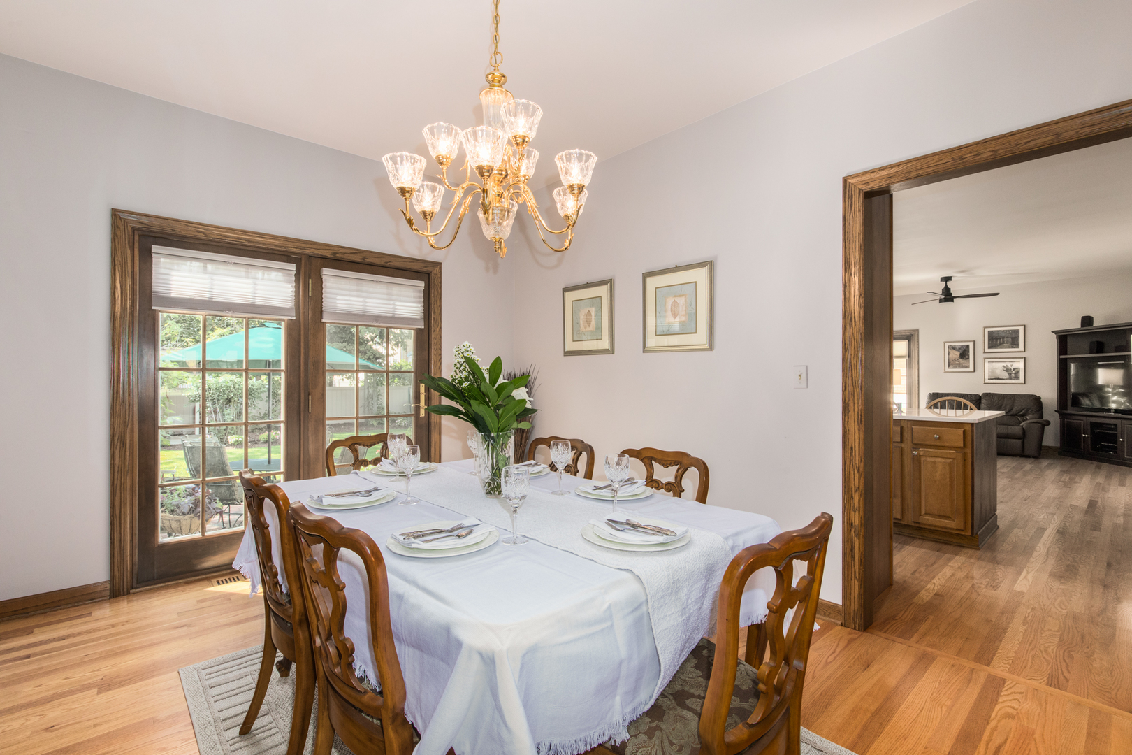 408 North Seminary Avenue Park Ridge, IL 60068 - Photo 6 of 26 a view of a dining room with furniture a chandelier and wooden floor