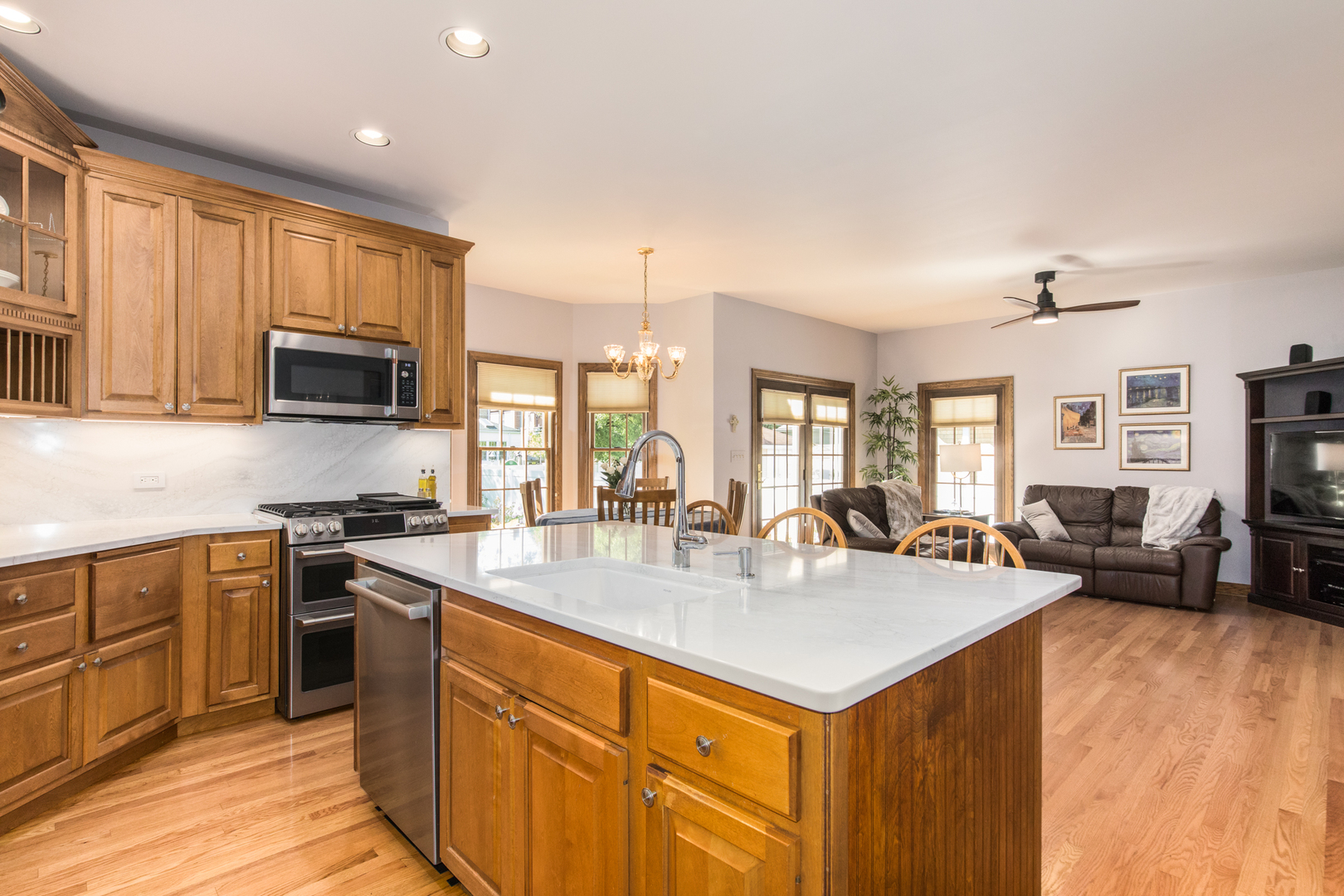 408 North Seminary Avenue Park Ridge, IL 60068 - Photo 10 of 26 a kitchen with stainless steel appliances granite countertop a sink stove and refrigerator