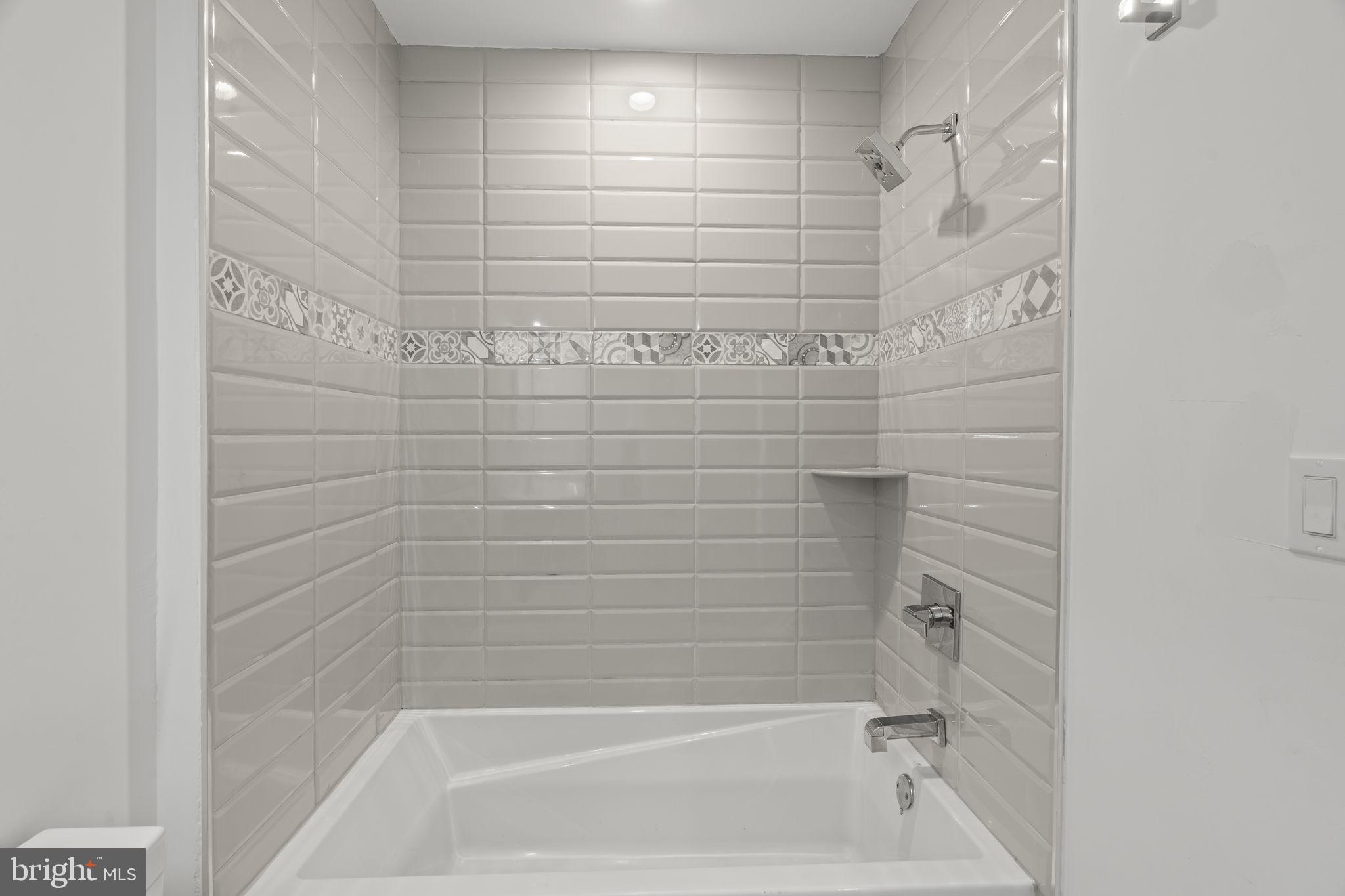 1244 South 20th Street, Unit 2 Philadelphia, PA 19146 - Photo 27 of 30 a close up of a bathtub