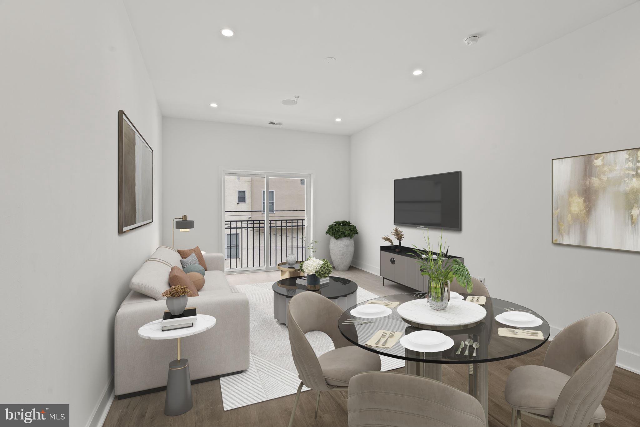 1244 South 20th Street, Unit 2 Philadelphia, PA 19146 - Photo 5 of 30 a living room with furniture and a flat screen tv
